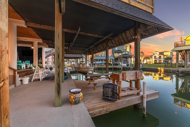 view of dock featuring a water view and boat lift