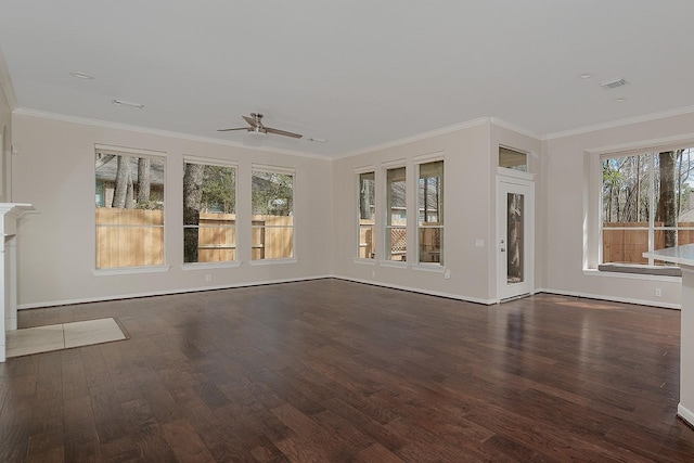 unfurnished living room featuring ornamental molding, wood finished floors, visible vents, and a ceiling fan