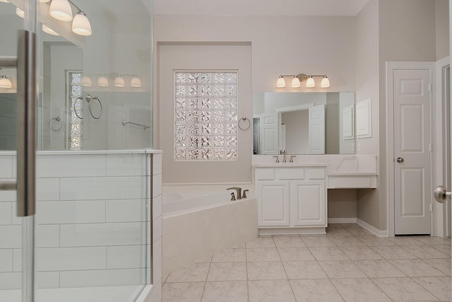 full bath with tile patterned floors, a tile shower, vanity, and a bath