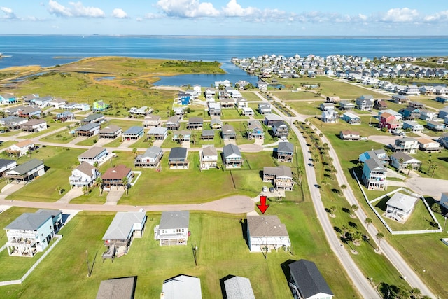 aerial view featuring a water view and a residential view