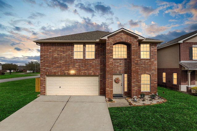 8234 Nagy Hill St, Spring, TX 77379 - traditional-style home featuring driveway, an attached garage, a lawn, brick siding, and a shingled roof