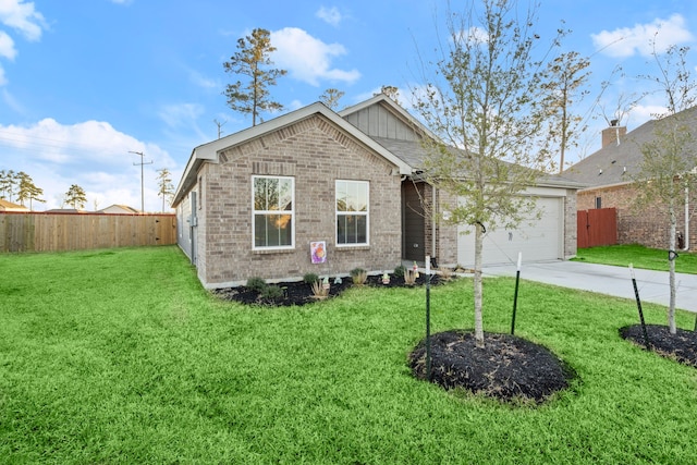 view of front of house featuring a garage, concrete driveway, brick siding, and a front yard