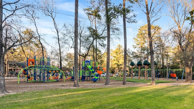 community playground featuring a lawn