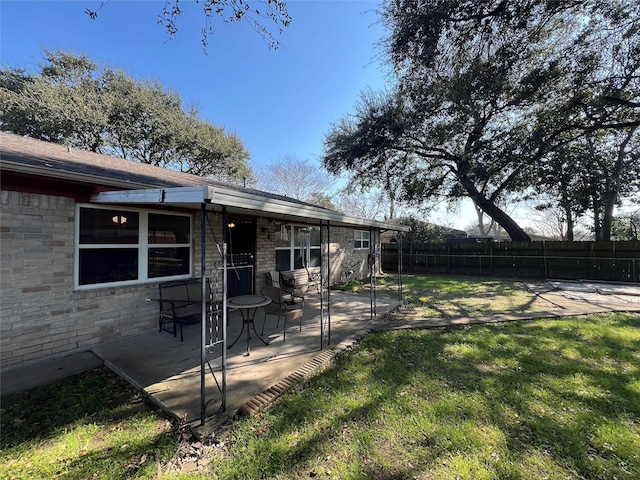 view of yard with a patio area and fence