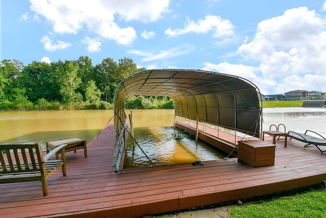 dock area with a water view