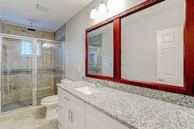 full bath with toilet, a stall shower, and vanity