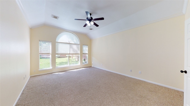 unfurnished room featuring baseboards, visible vents, lofted ceiling, ceiling fan, and carpet floors