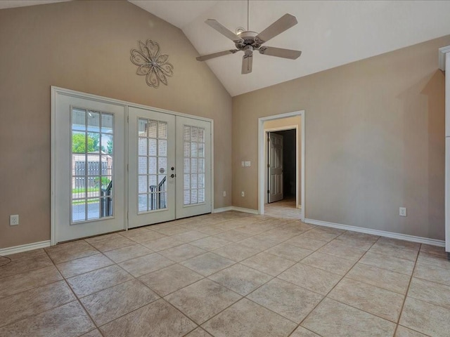 2601 Woodstock Dr, Lufkin, TX 75904 - doorway to outside featuring french doors, high vaulted ceiling, a ceiling fan, light tile patterned flooring, and baseboards