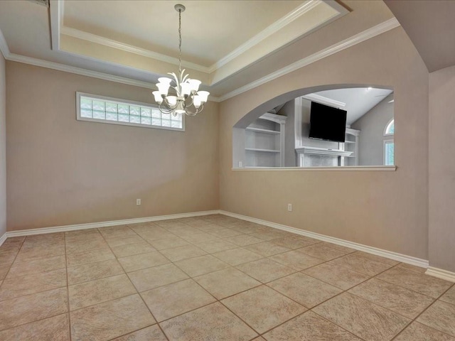 2601 Woodstock Dr, Lufkin, TX 75904 - tiled empty room with a chandelier, a raised ceiling, baseboards, and crown molding