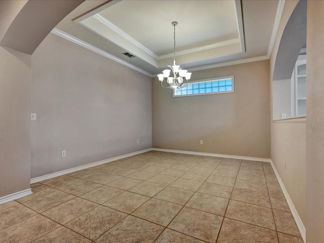 2601 Woodstock Dr, Lufkin, TX 75904 - tiled empty room featuring a raised ceiling, a chandelier, and ornamental molding