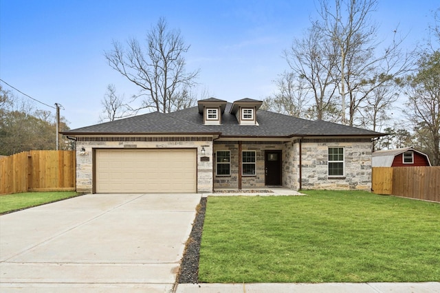 view of front of property featuring a garage, a shingled roof, concrete driveway, fence, and a front lawn