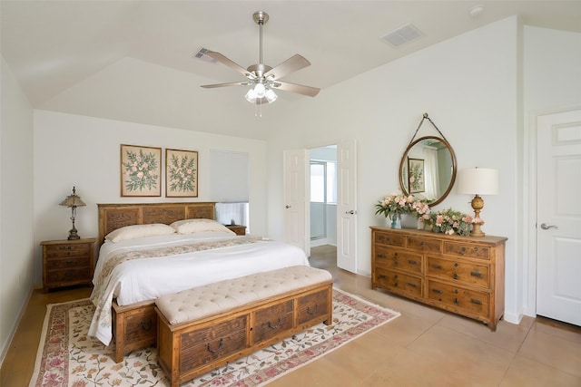 bedroom featuring lofted ceiling, light tile patterned floors, ceiling fan, and visible vents