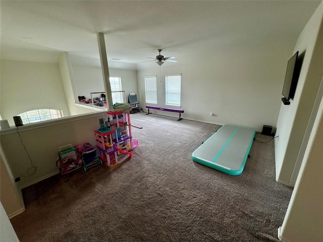 playroom with carpet and baseboards