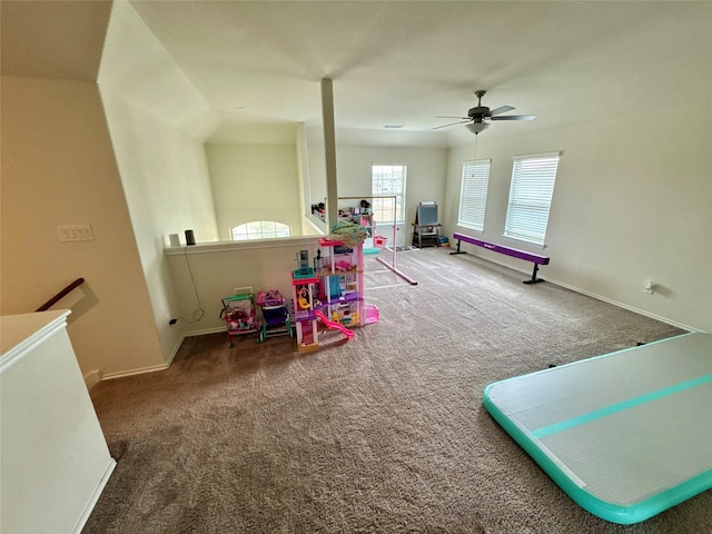 rec room with carpet flooring and baseboards