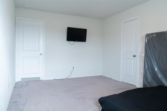 18802 Verdura Dr, New Caney, TX 77357 - carpeted bedroom with baseboards