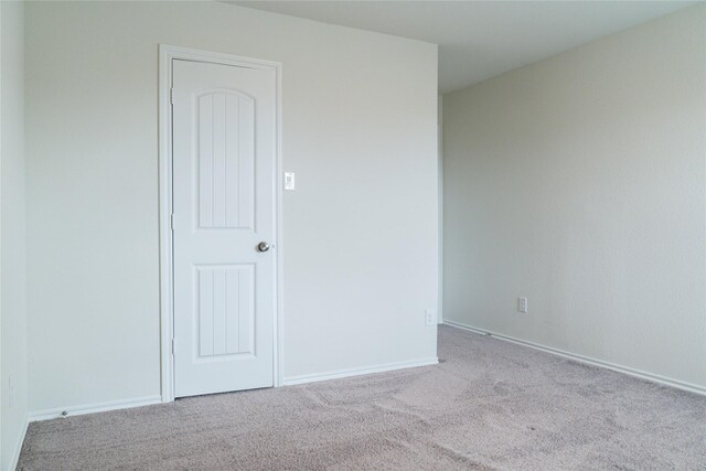 18802 Verdura Dr, New Caney, TX 77357 - empty room featuring carpet flooring and baseboards