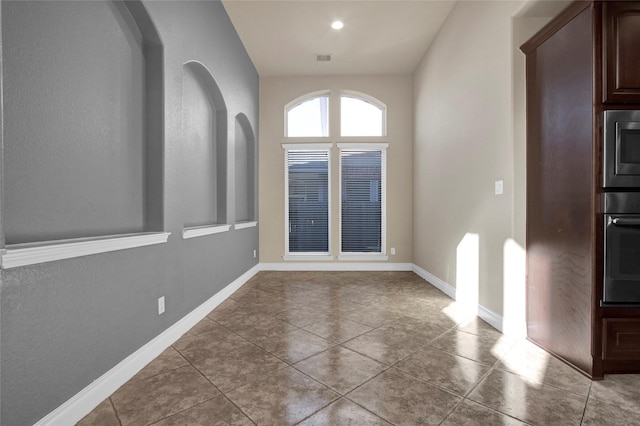 interior space with visible vents and baseboards