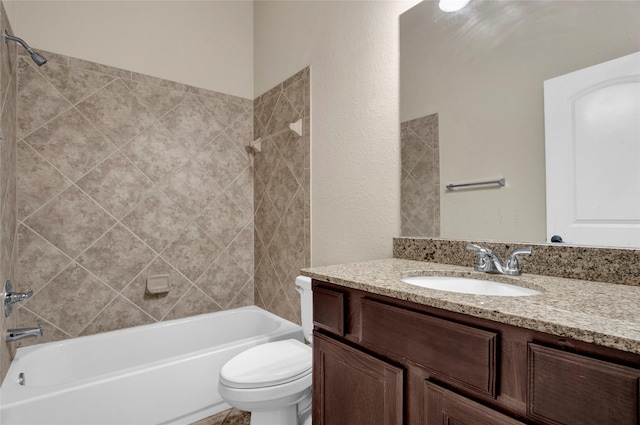 full bath with toilet, vanity, and shower / bathtub combination