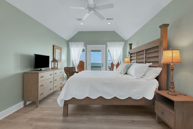 bedroom featuring access to outside, visible vents, vaulted ceiling, and light wood-style flooring