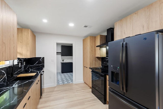 kitchen with visible vents, fridge with ice dispenser, modern cabinets, black range with electric cooktop, and wall chimney exhaust hood