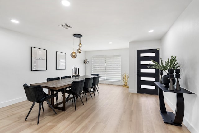 dining area featuring light wood-type flooring, visible vents, baseboards, and recessed lighting