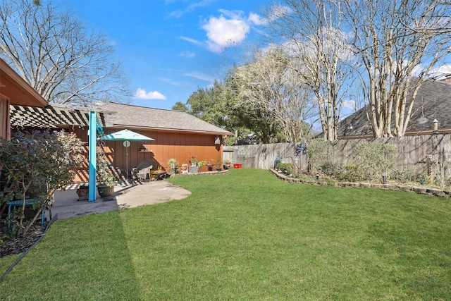 view of yard with fence, a pergola, and a patio