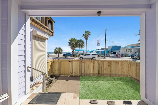 view of patio / terrace featuring fence