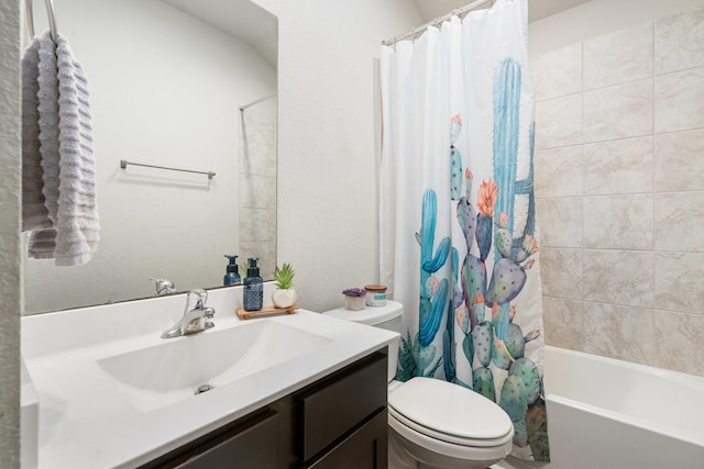 bathroom with shower / tub combo, vanity, and toilet