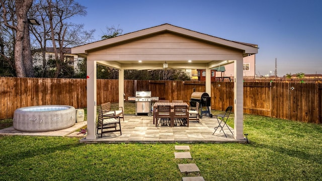 view of patio featuring a fenced backyard and grilling area