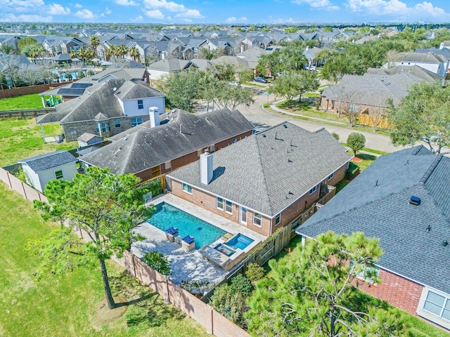 drone / aerial view with a residential view