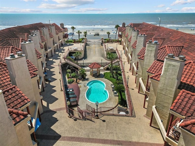 birds eye view of property with a water view