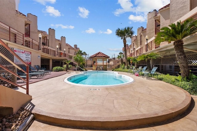 view of pool with a patio