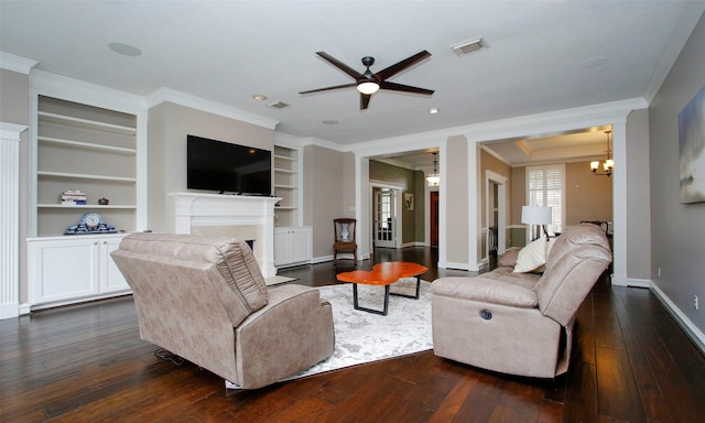 living area with baseboards, visible vents, dark wood-style floors, ornamental molding, and a fireplace