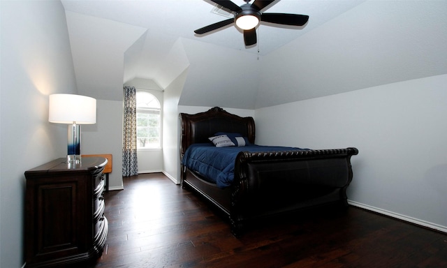 bedroom featuring ceiling fan, baseboards, vaulted ceiling, and wood finished floors