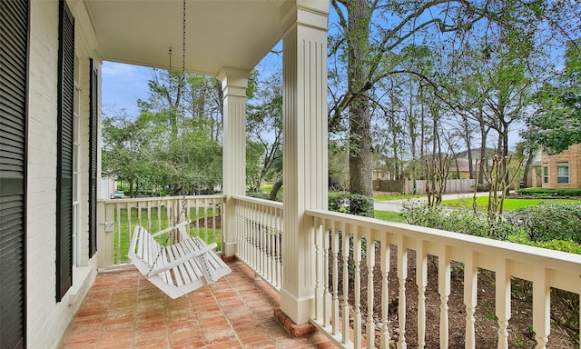 balcony featuring a porch