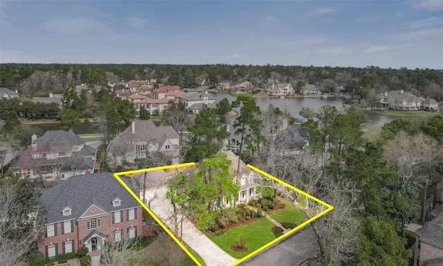 aerial view with a water view and a residential view