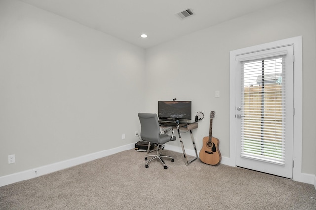 carpeted office with a wealth of natural light, recessed lighting, visible vents, and baseboards