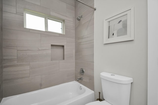 bathroom with shower / washtub combination and toilet