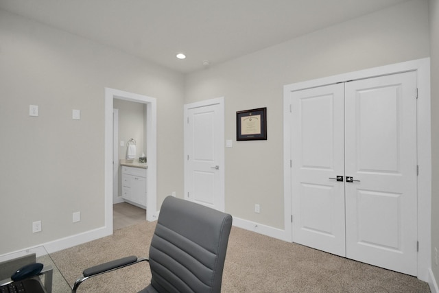 office featuring light carpet, recessed lighting, and baseboards