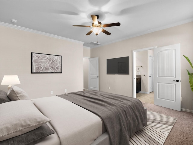 bedroom featuring light carpet, visible vents, a ceiling fan, ornamental molding, and ensuite bathroom