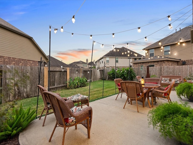 view of patio featuring outdoor dining space and a fenced backyard