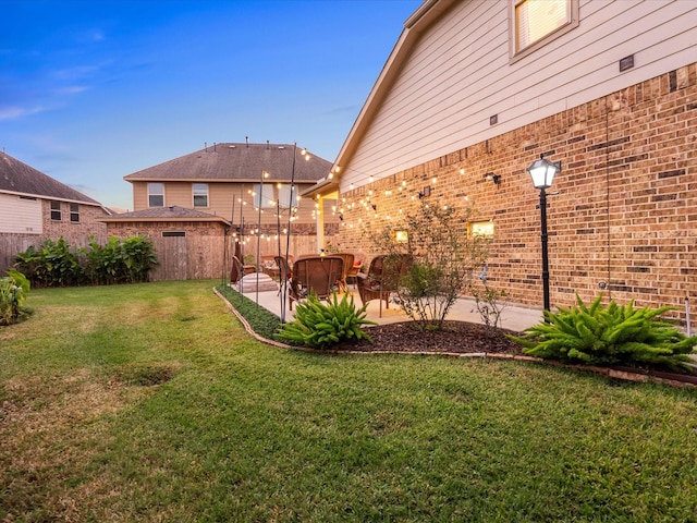 view of yard with a patio area and fence