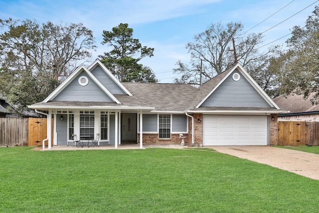 view of front of property with brick siding, a front yard, and fence