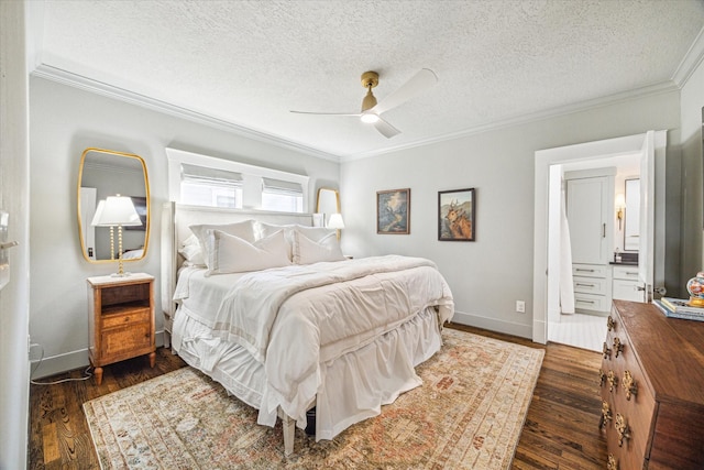 bedroom featuring a textured ceiling, baseboards, dark wood-type flooring, and crown molding