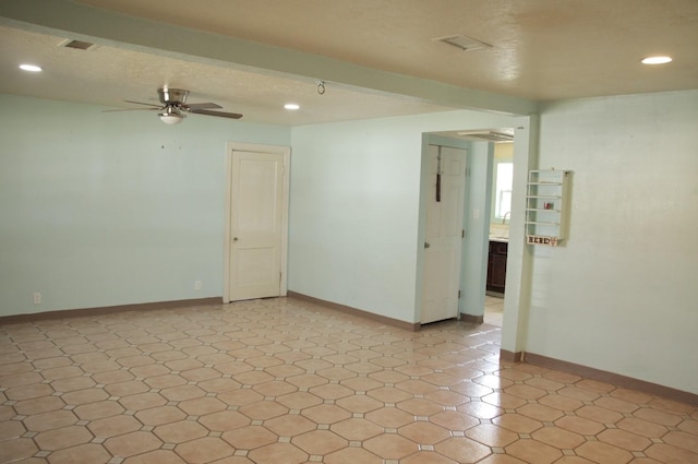 unfurnished room featuring recessed lighting, visible vents, ceiling fan, and baseboards