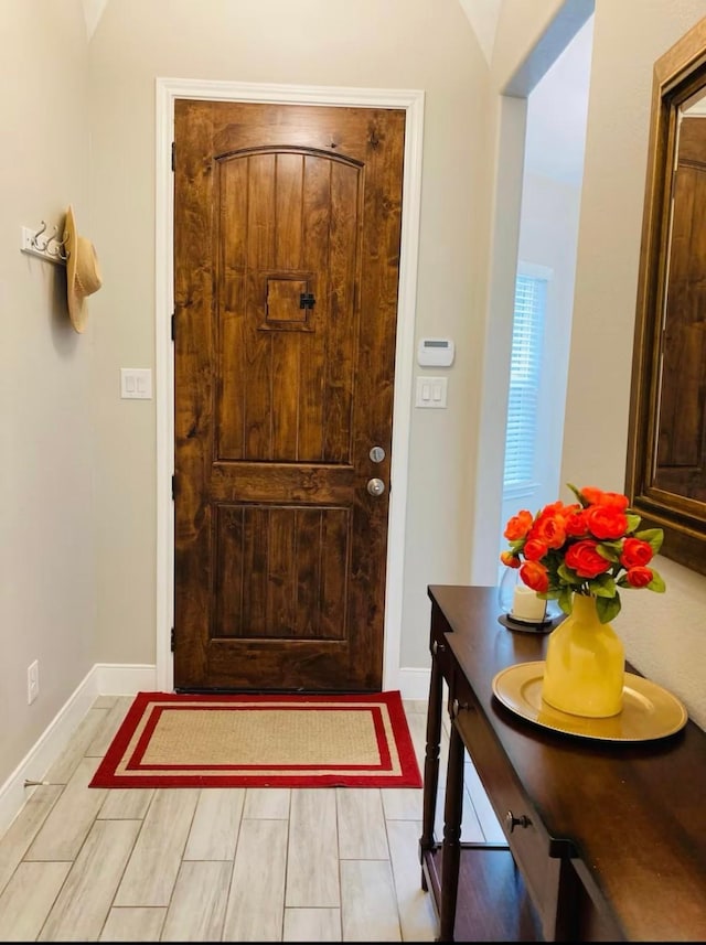 entrance foyer featuring baseboards