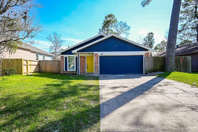 view of front of property featuring brick siding, concrete driveway, an attached garage, fence, and a front lawn