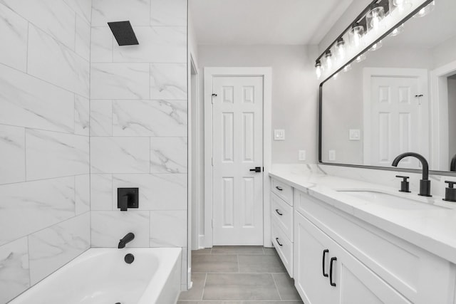 bathroom featuring  shower combination and vanity