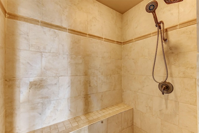 details featuring tiled shower