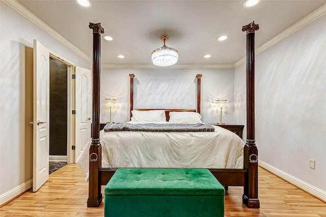 bedroom featuring recessed lighting, baseboards, wood finished floors, and crown molding